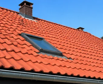 Illustration d’une rénovation de couverture en tuiles